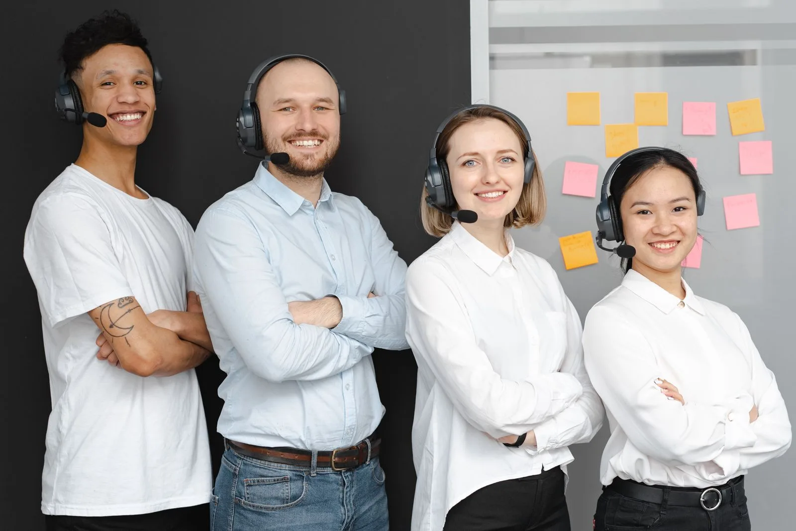 Customer support professionals working together in a call center